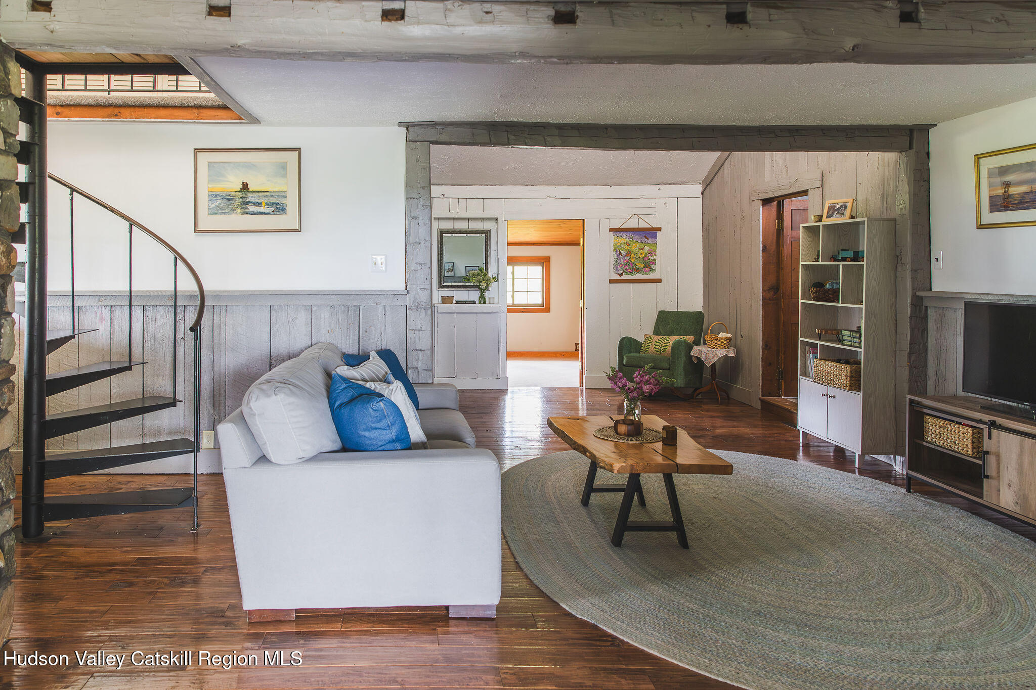506 Cunningham Road Durham, NY 12422 - Photo 19 of 37 a living room with furniture and a flat screen tv