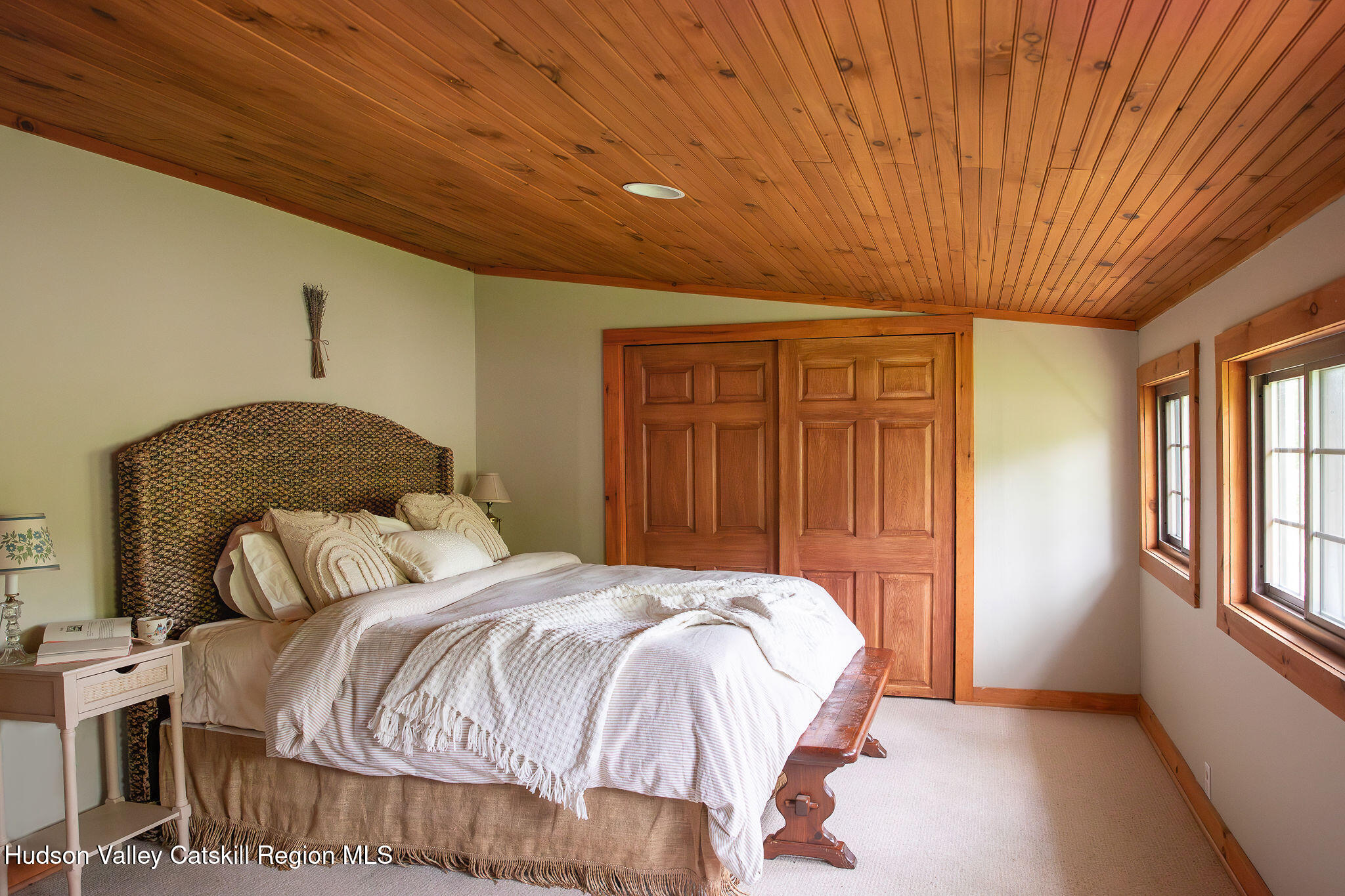 506 Cunningham Road Durham, NY 12422 - Photo 21 of 37 a bedroom with a bed and a window