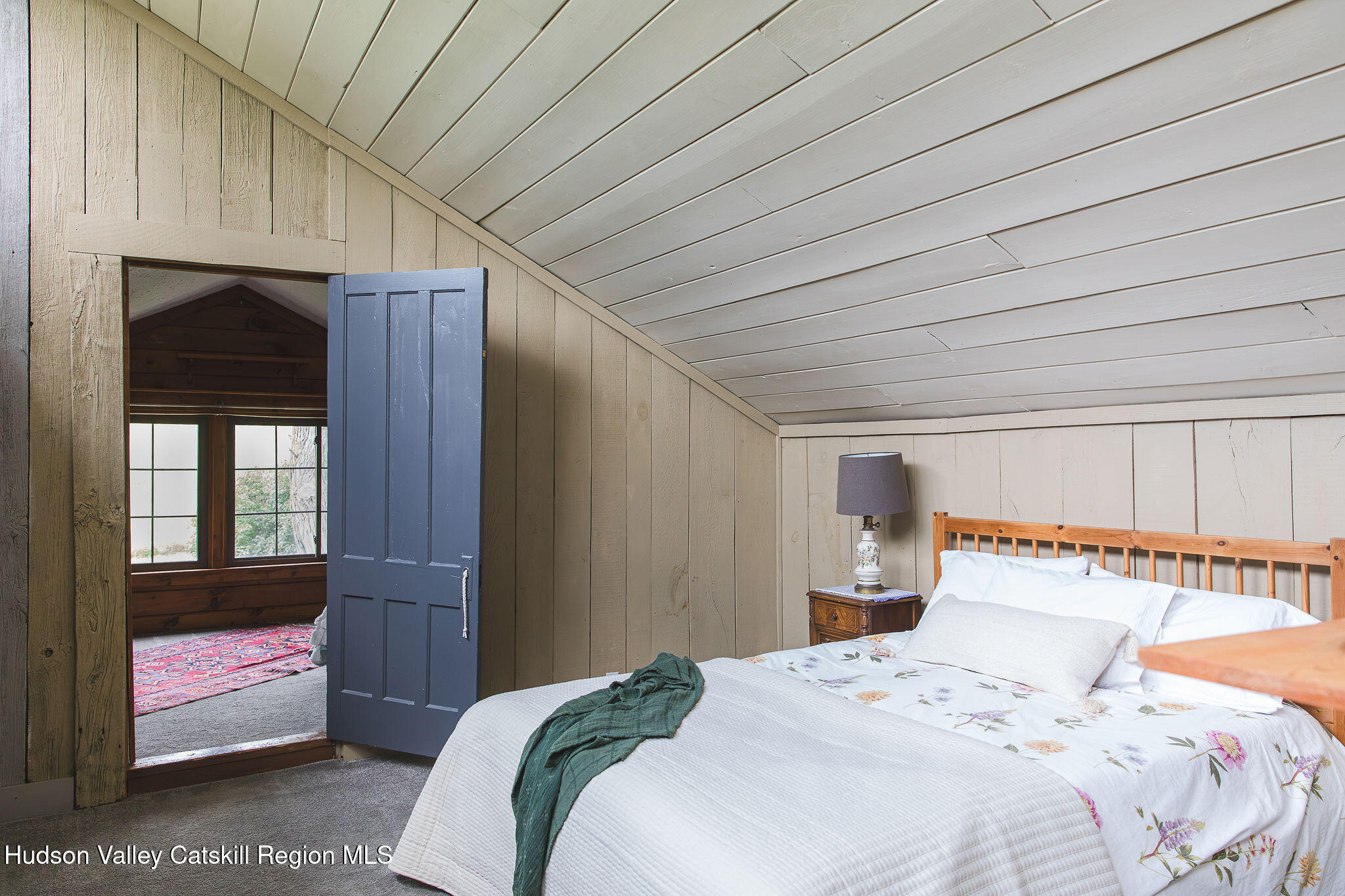 506 Cunningham Road Durham, NY 12422 - Photo 27 of 37 a bedroom with a bed and a window