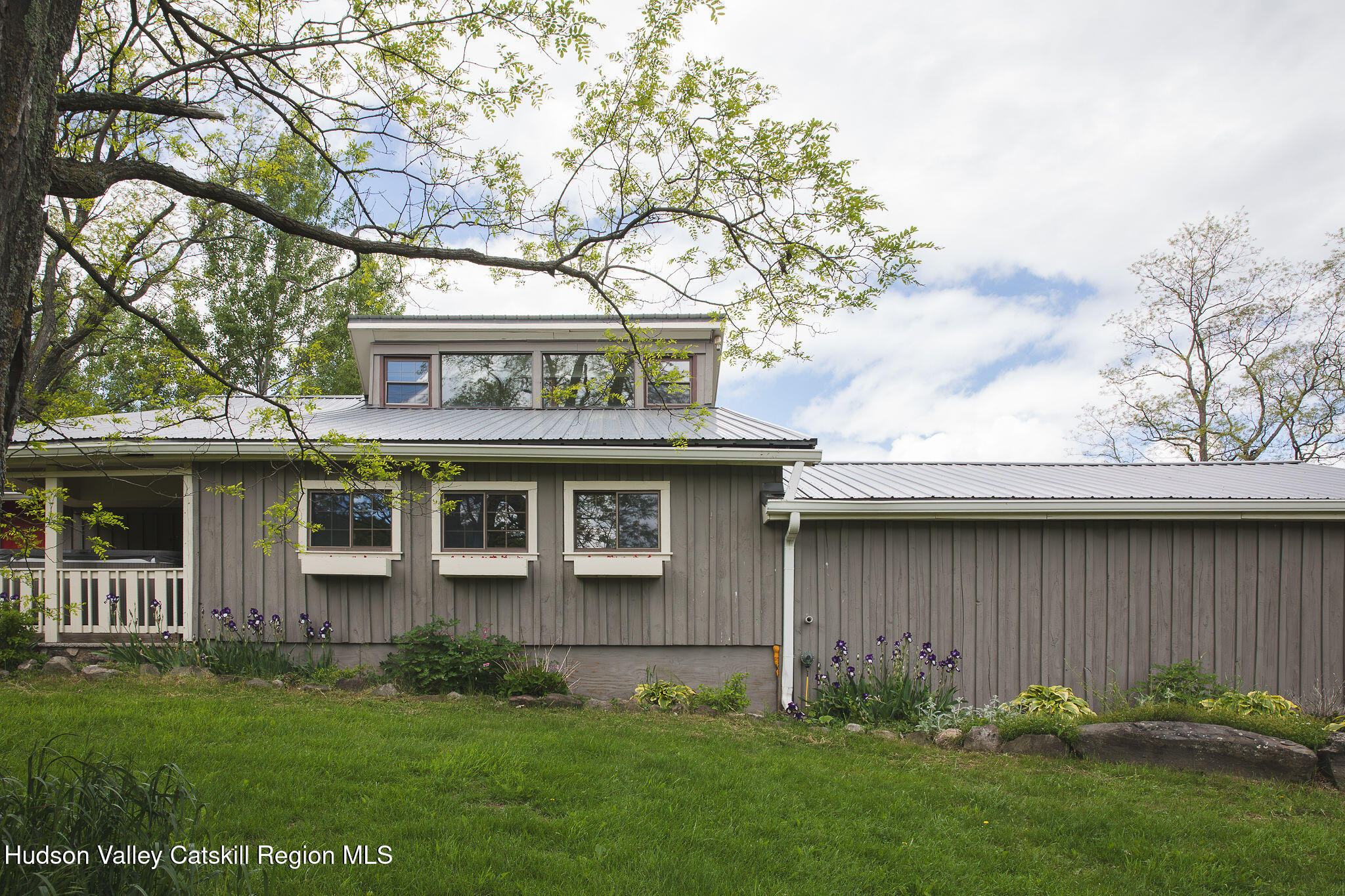 506 Cunningham Road Durham, NY 12422 - Photo 31 of 37 a view of a house with a garden