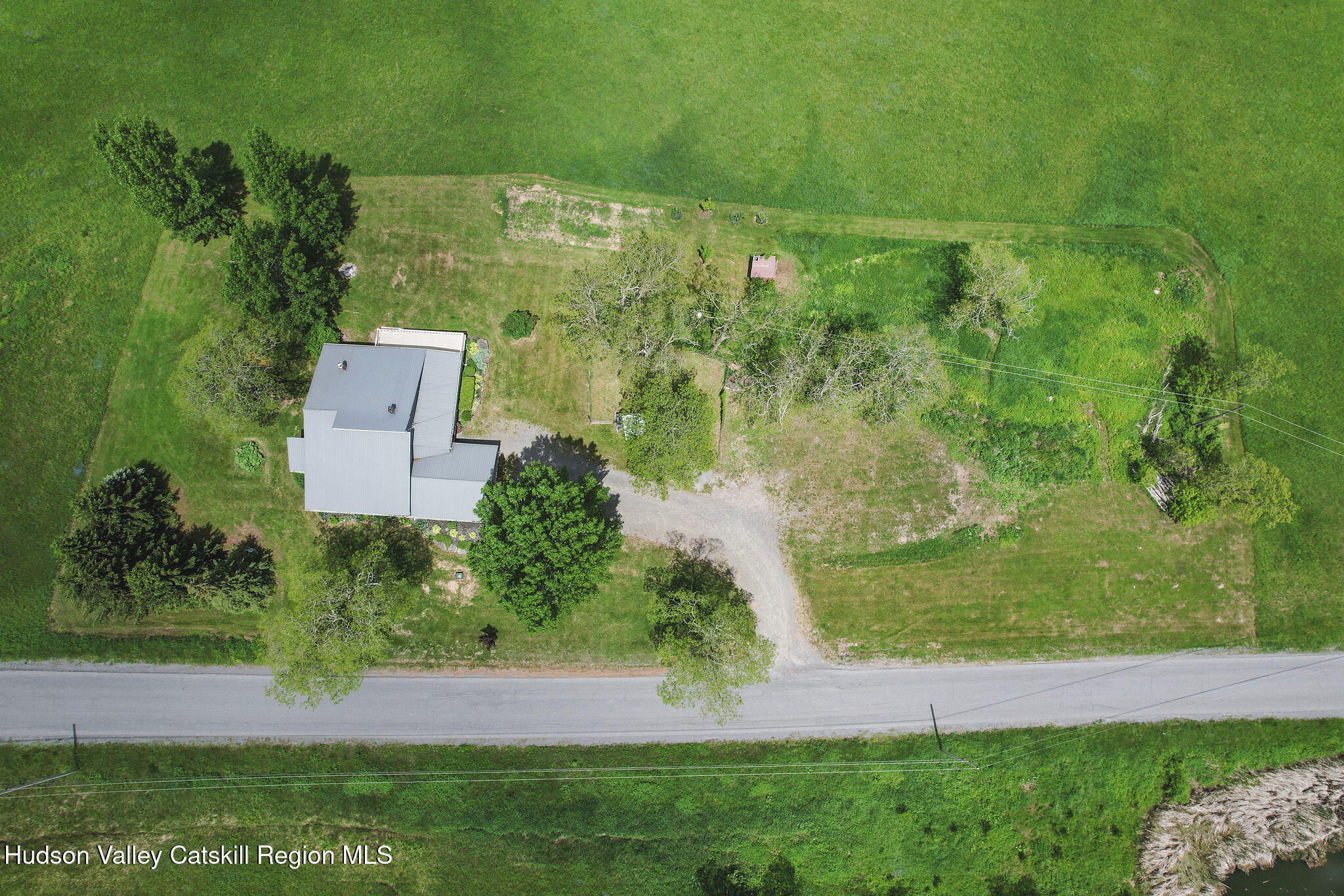 506 Cunningham Road Durham, NY 12422 - Photo 35 of 37 an aerial view of a house with a yard