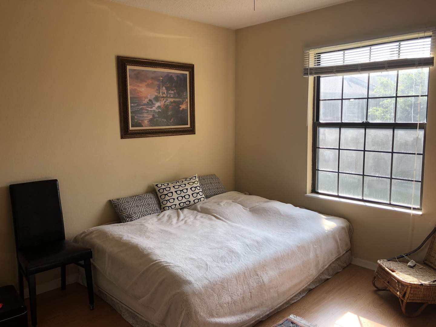 2048 North Rand Road, Unit 202 Palatine, IL 60074 - Photo 7 of 12 a bedroom with a bed and a window
