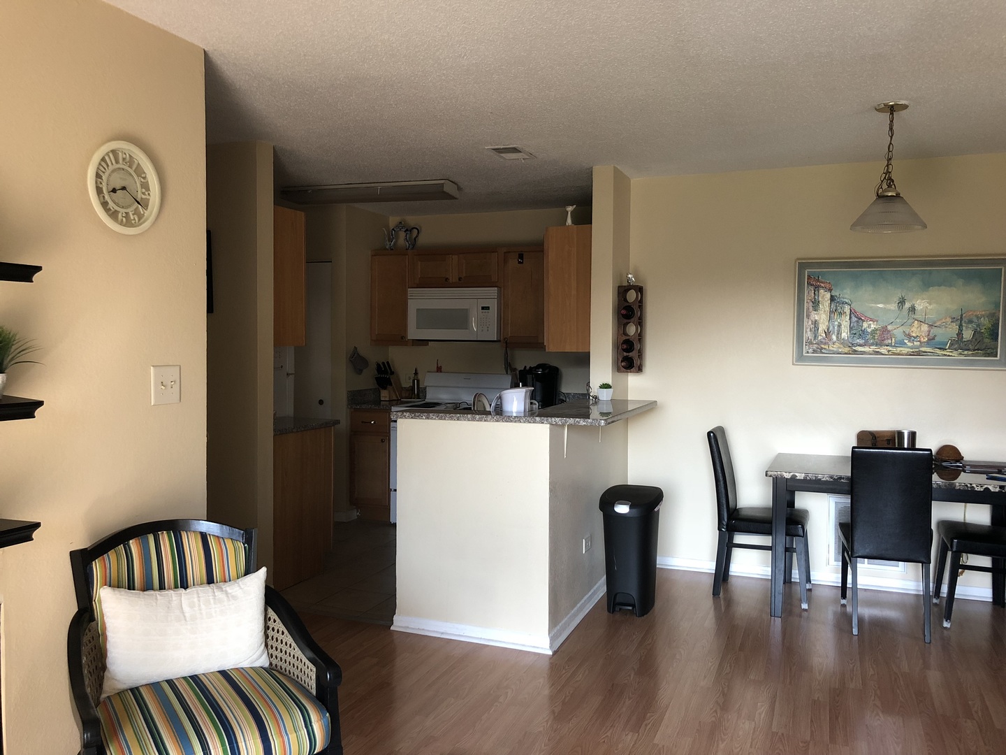 2048 North Rand Road, Unit 202 Palatine, IL 60074 - Photo 8 of 12 a view of kitchen with cabinets and wooden floor