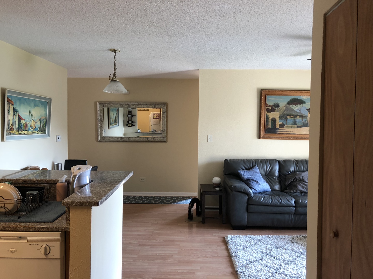 2048 North Rand Road, Unit 202 Palatine, IL 60074 - Photo 10 of 12 a living room with furniture and a window