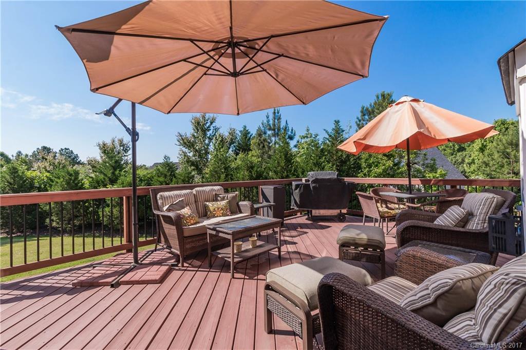 634 Panthers Way Fort Mill, SC 29708 - Photo 22 of 24 a view of a patio with wooden floor