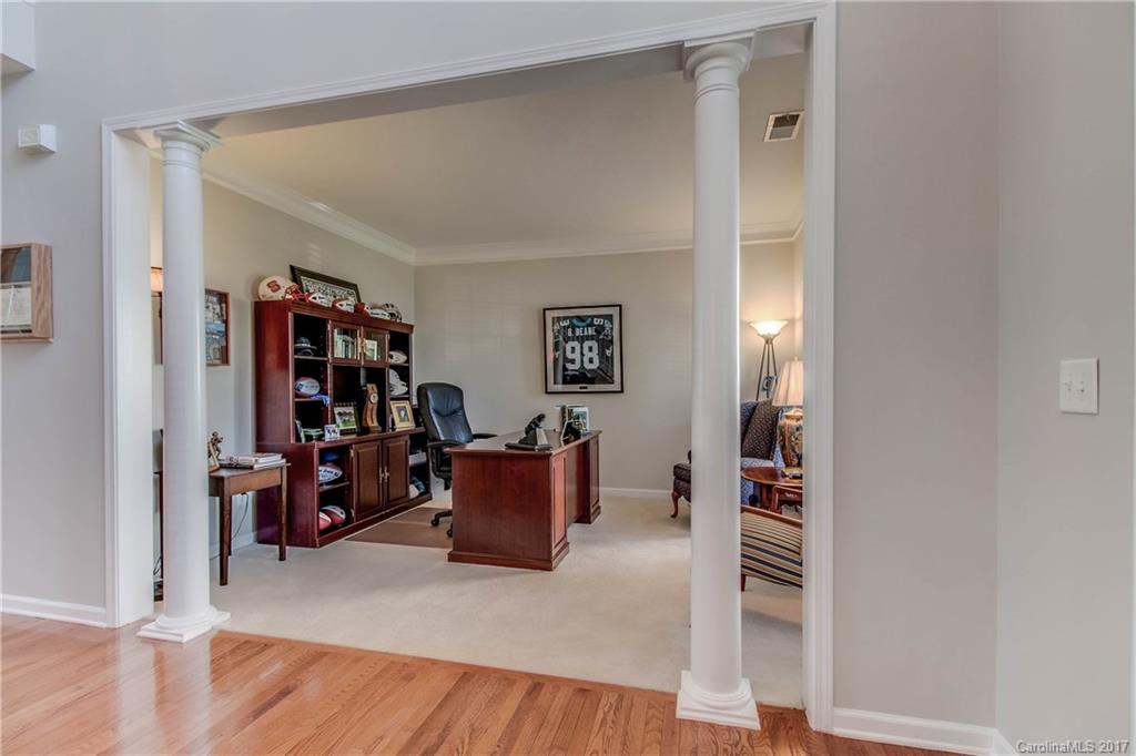 634 Panthers Way Fort Mill, SC 29708 - Photo 5 of 24 an empty room with furniture and wooden floor