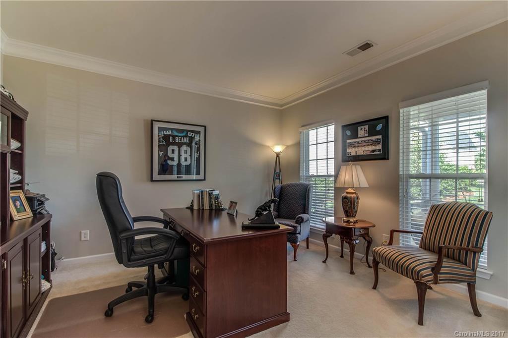 634 Panthers Way Fort Mill, SC 29708 - Photo 6 of 24 a view of a livingroom with workspace and a window