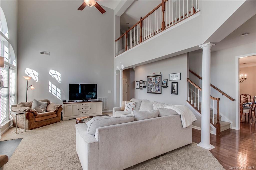 634 Panthers Way Fort Mill, SC 29708 - Photo 8 of 24 a living room with furniture and a flat screen tv