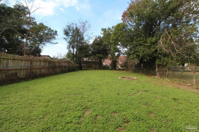 a view of a backyard with a garden