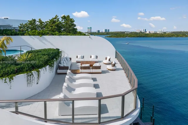 a view of a swimming pool and lounge chair