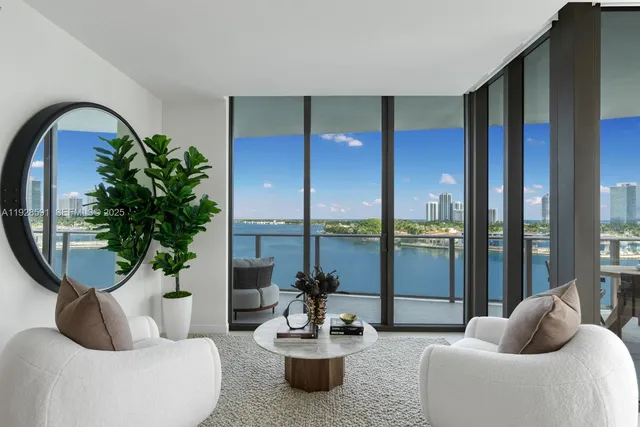 a balcony with furniture and a potted plant