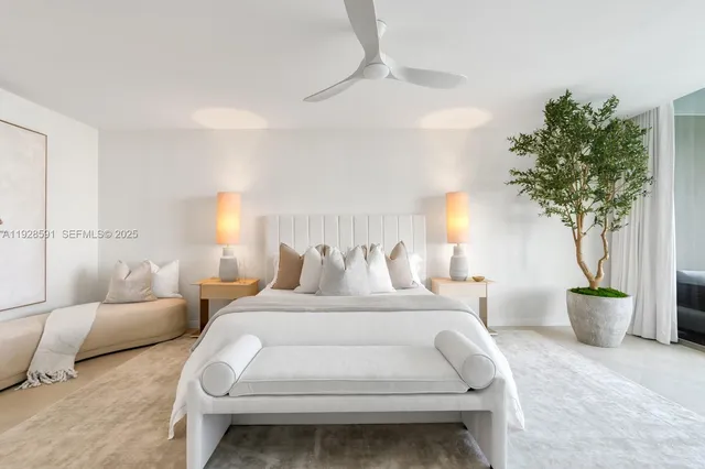 a spacious bathroom with a shower sink and mirror