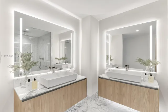 a living room with furniture and white walls