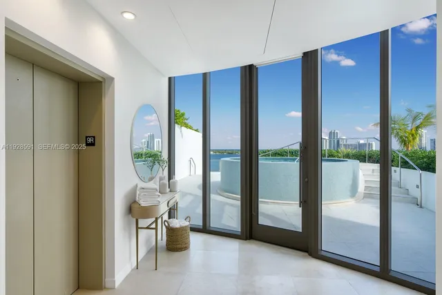 a kitchen with stainless steel appliances kitchen island granite countertop a sink and cabinets