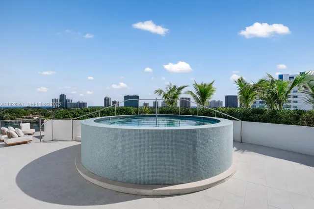 a view of a balcony with chair and table