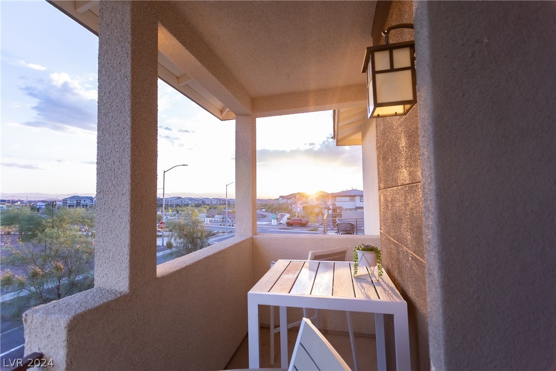 916 East Sunset Road Henderson, NV 89011 - Photo 21 of 49 Primary bedroom balcony with sunset view