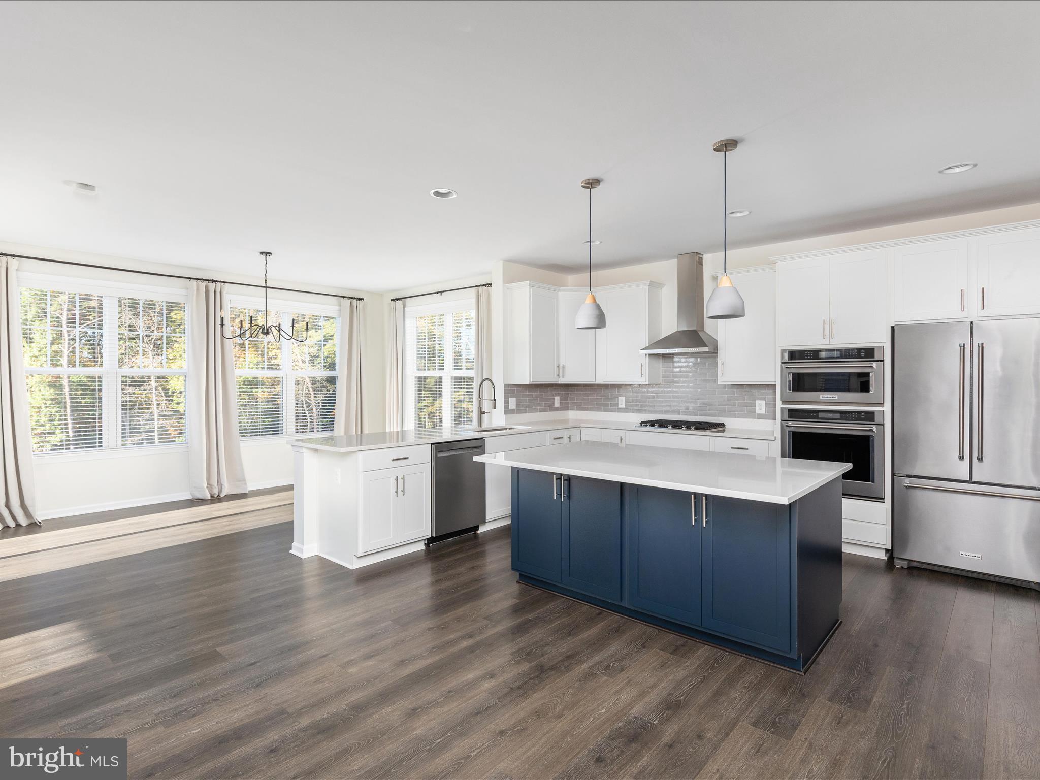 138 Jewel Stephenson, VA 22656 - Photo 12 of 70 a large kitchen with kitchen island a large counter top space and stainless steel appliances