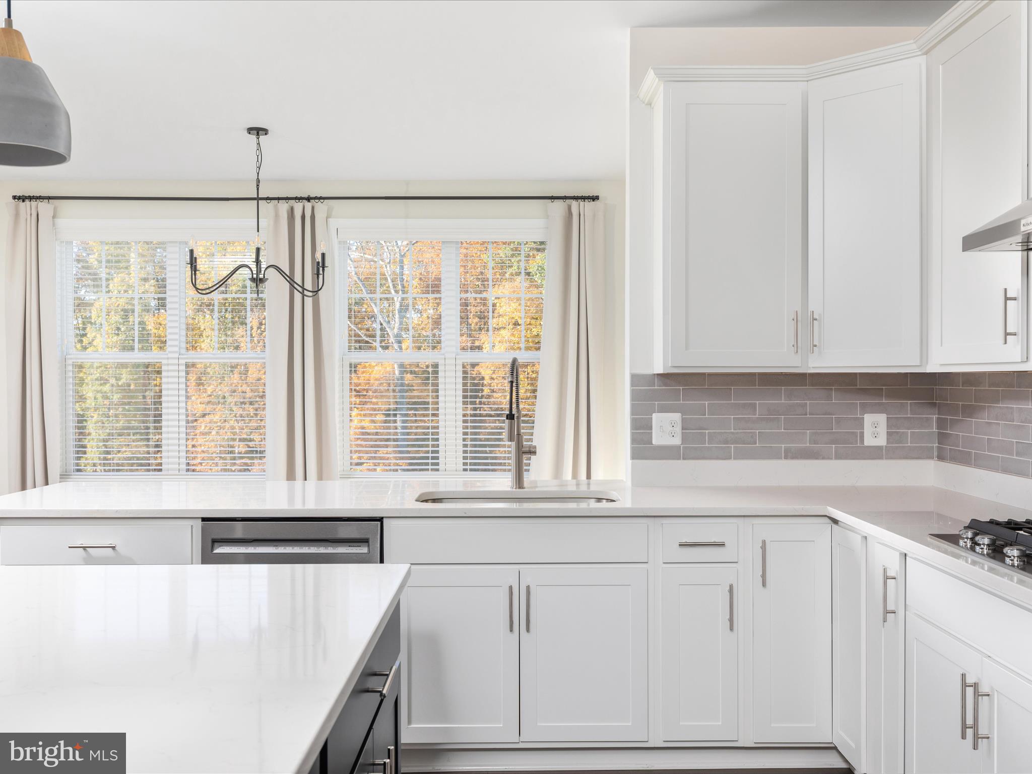 138 Jewel Stephenson, VA 22656 - Photo 10 of 70 a kitchen with a white cabinets and a large window