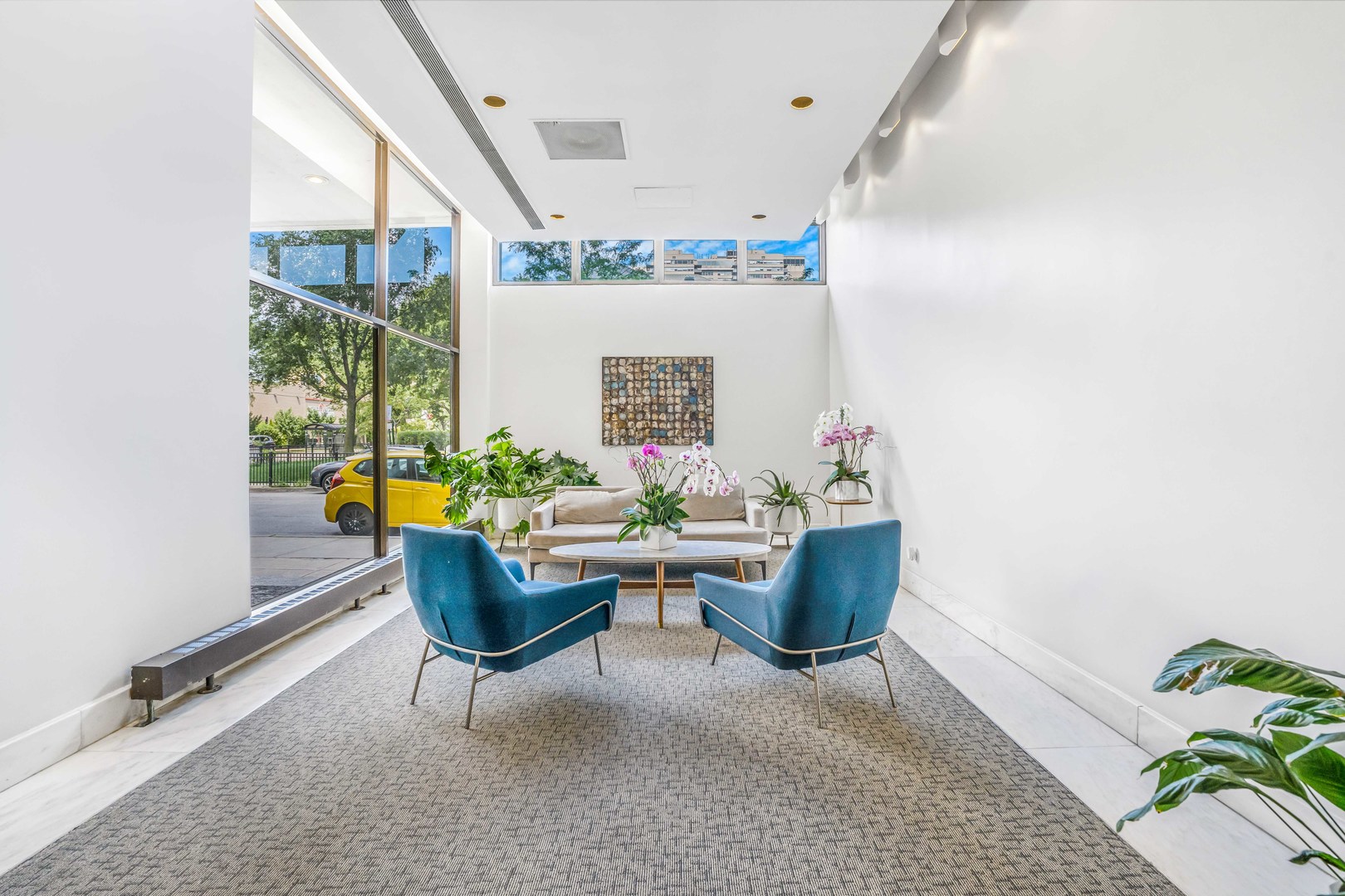 6171 North Sheridan Road, Unit 1804 Chicago, IL 60660 - Photo 29 of 29 a living room with furniture and a table