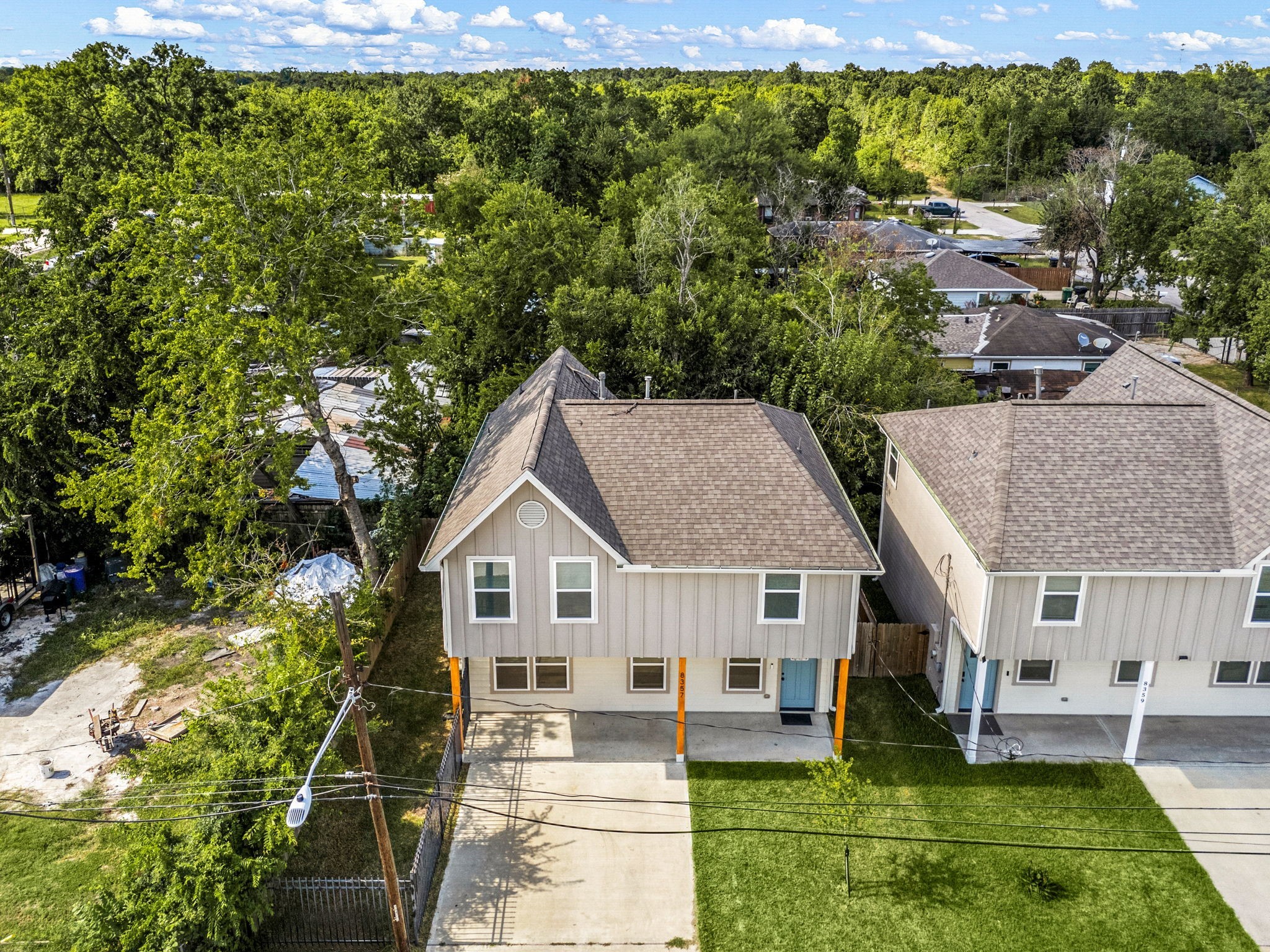 8357 Tate Street Houston, TX 77028 - Photo 31 of 42 a aerial view of a house with swimming pool and garden