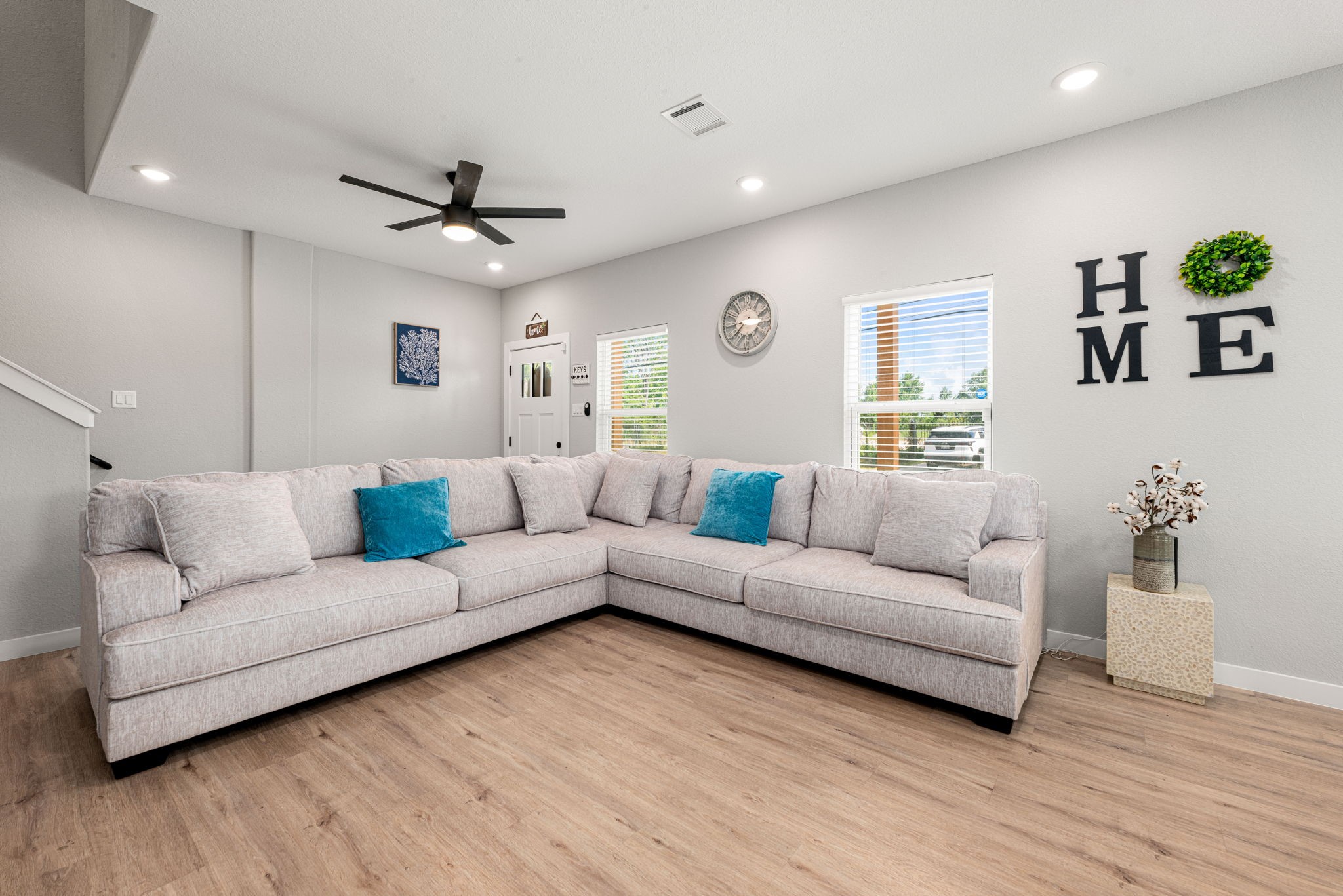 8357 Tate Street Houston, TX 77028 - Photo 10 of 42 a living room with furniture and a wooden floor