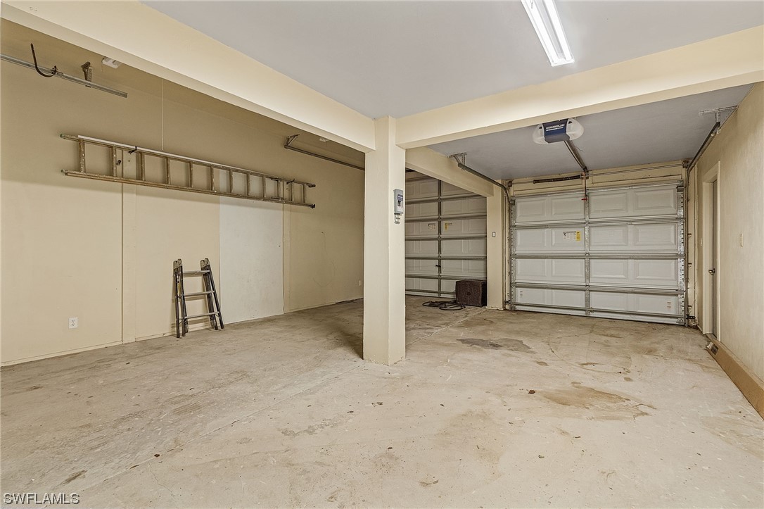 8185 Egret Road Fort Myers, FL 33967 - Photo 28 of 35 a view of room with garage