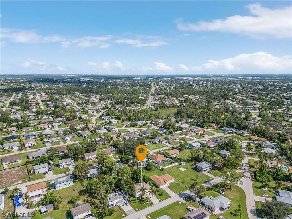 8185 Egret Road Fort Myers, FL 33967 - Photo 31 of 35 an aerial view of residential building with green space