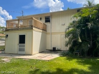 8185 Egret Road Fort Myers, FL 33967 - Photo 32 of 35 a view of a back yard of the house