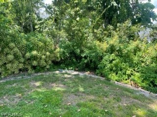 8185 Egret Road Fort Myers, FL 33967 - Photo 35 of 35 a big yard with lots of green space and deers