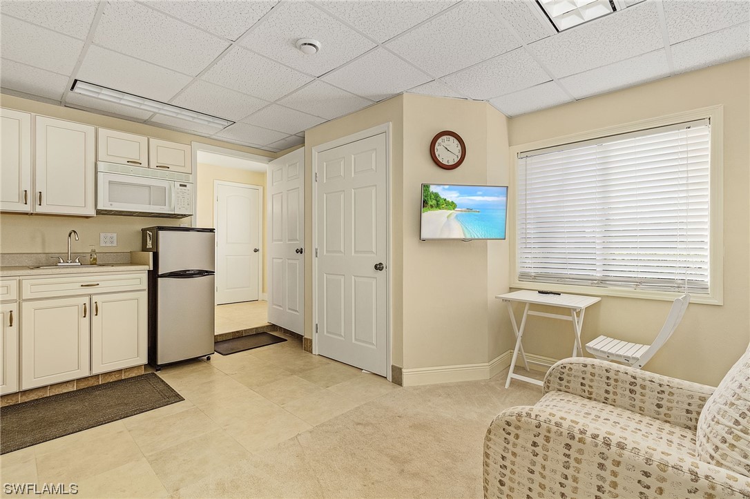 8185 Egret Road Fort Myers, FL 33967 - Photo 6 of 35 a bedroom with a bed and a window