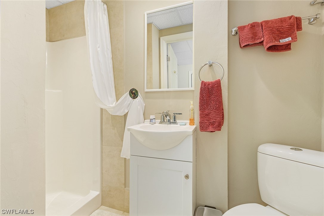 8185 Egret Road Fort Myers, FL 33967 - Photo 9 of 35 a bathroom with a sink and a toilet