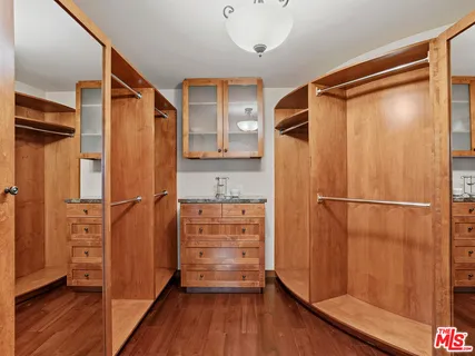 a bathroom with a shower and a glass door
