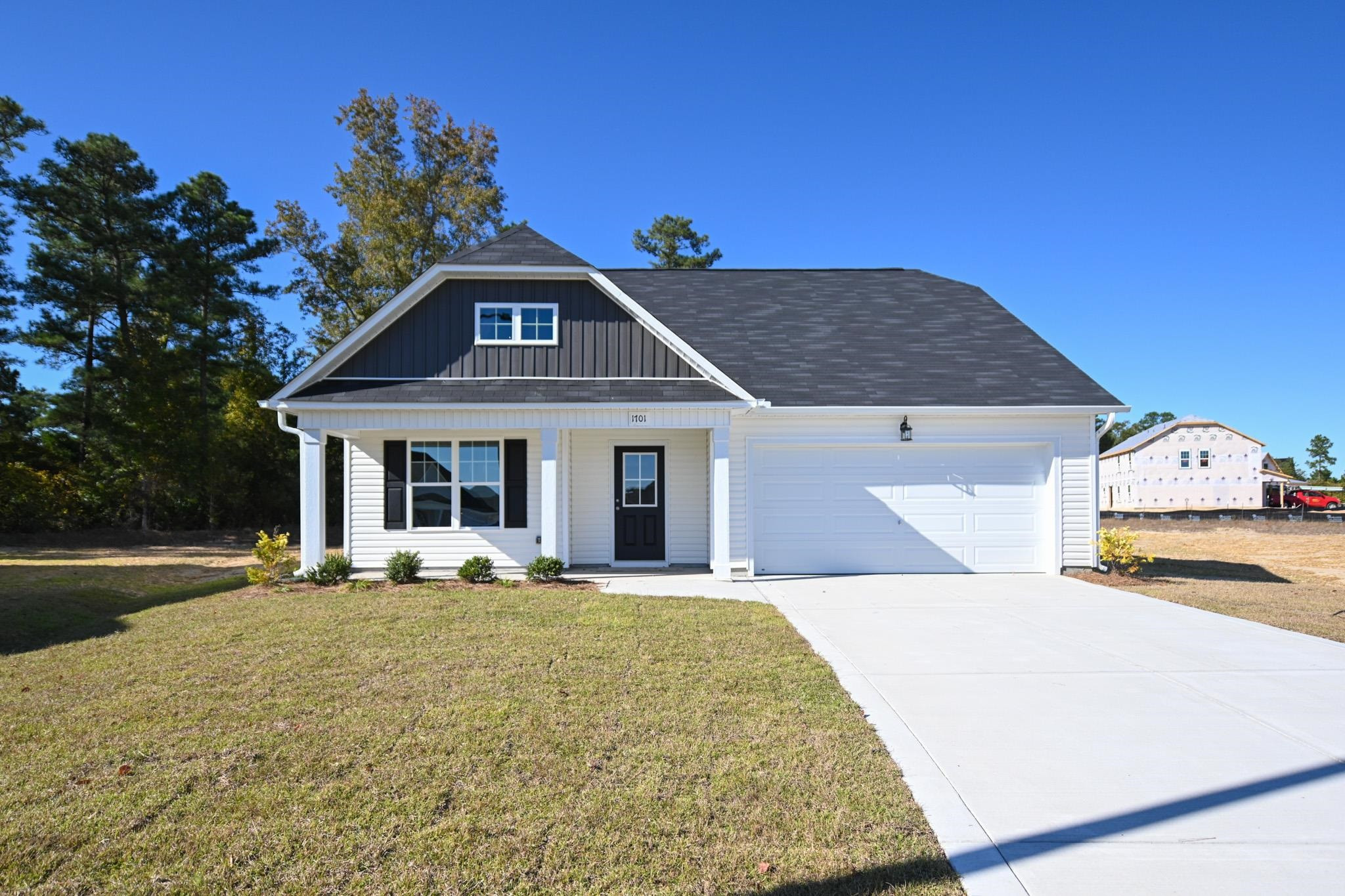 1701 Ramsdale Road Hope Mills, NC 28348 - Photo 2 of 25 a front view of a house with a yard