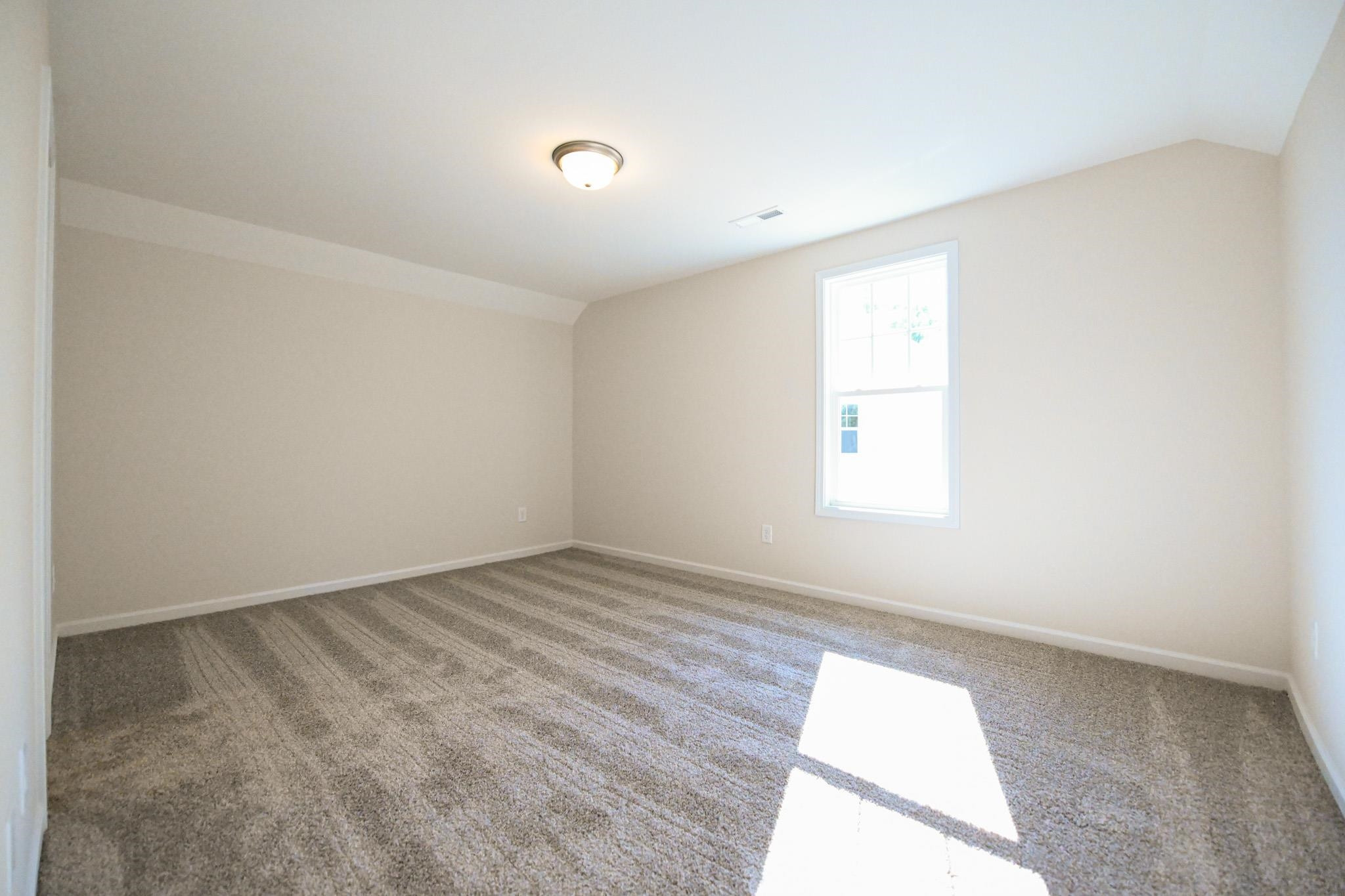 1701 Ramsdale Road Hope Mills, NC 28348 - Photo 22 of 25 an empty room with a window