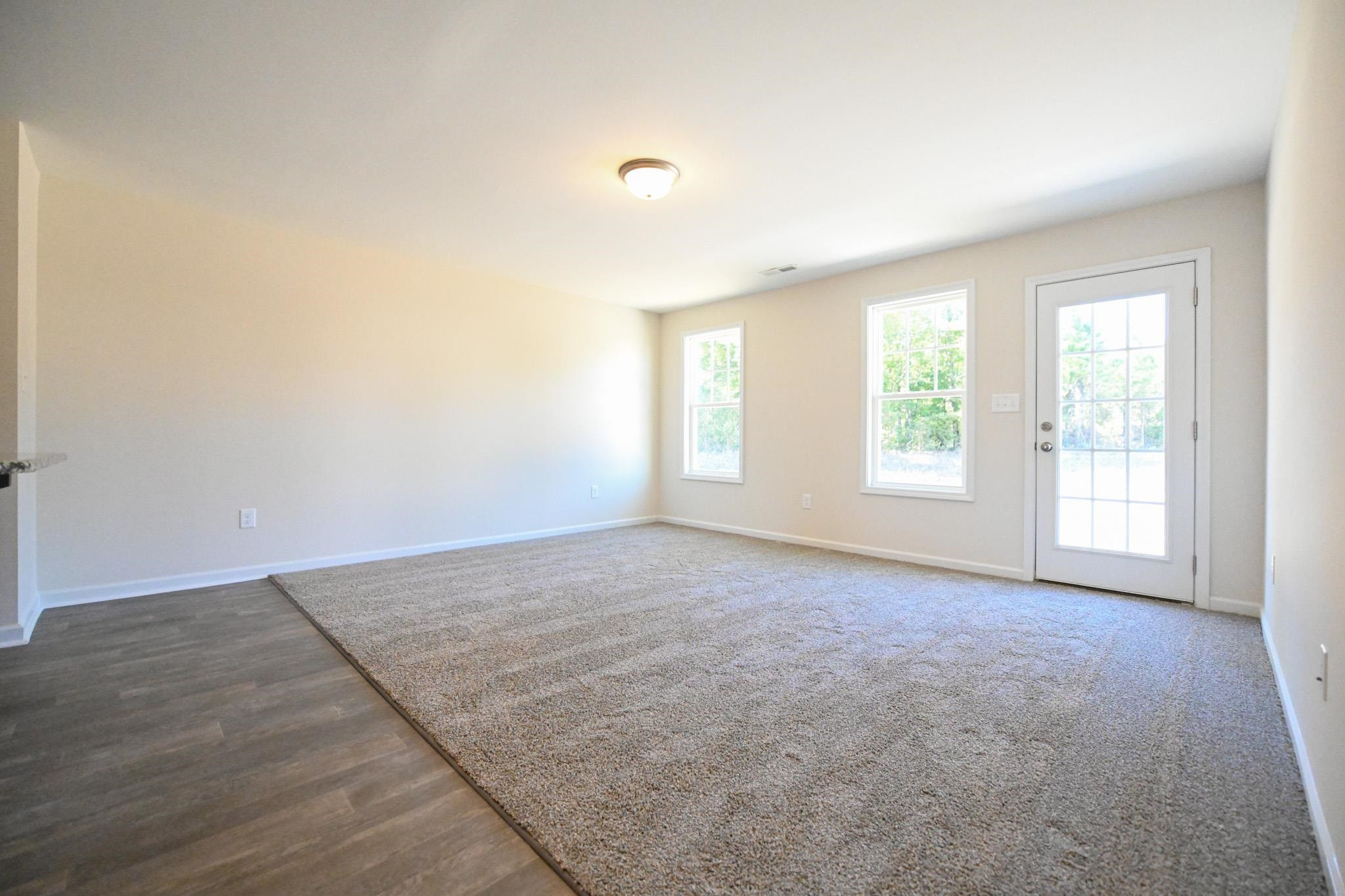 1701 Ramsdale Road Hope Mills, NC 28348 - Photo 5 of 25 an empty room with windows