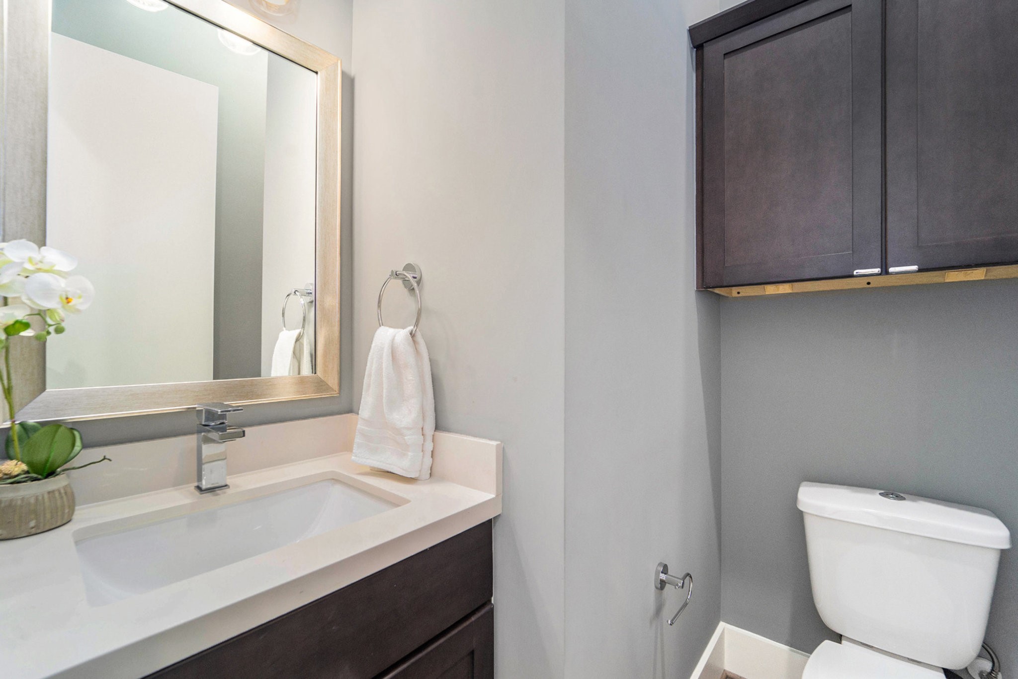 1507 Truxillo Street, Unit A Houston, TX 77004 - Photo 17 of 30 a bathroom with a sink a toilet and a mirror