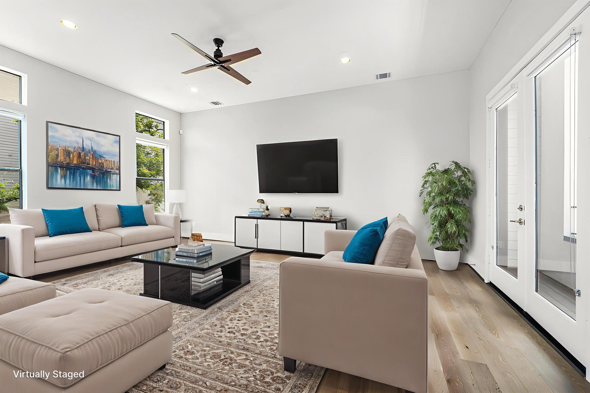 1507 Truxillo Street, Unit A Houston, TX 77004 - Photo 7 of 30 a living room with furniture and a flat screen tv