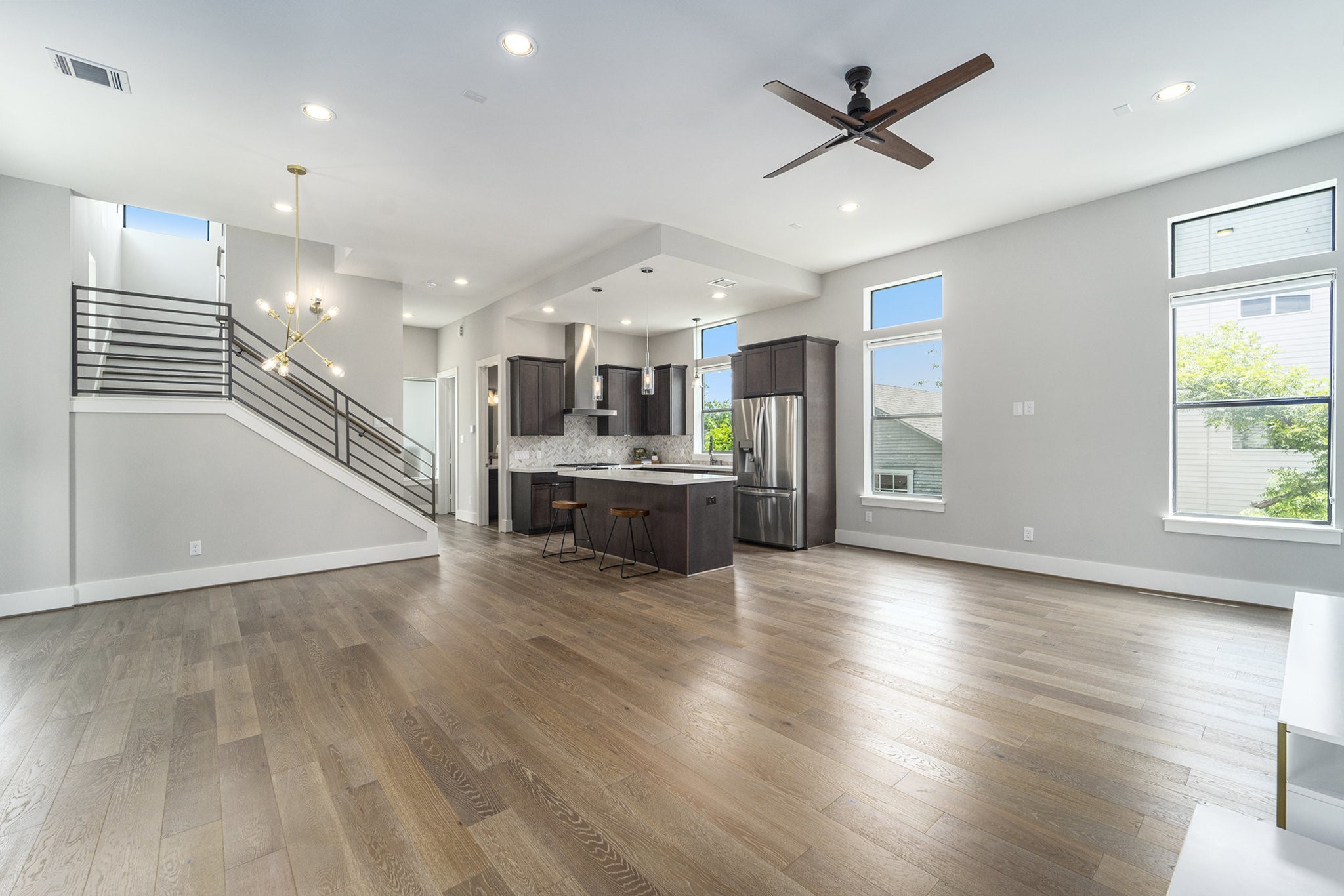 1507 Truxillo Street, Unit A Houston, TX 77004 - Photo 9 of 30 a view of a kitchen with a sink and a stove top oven
