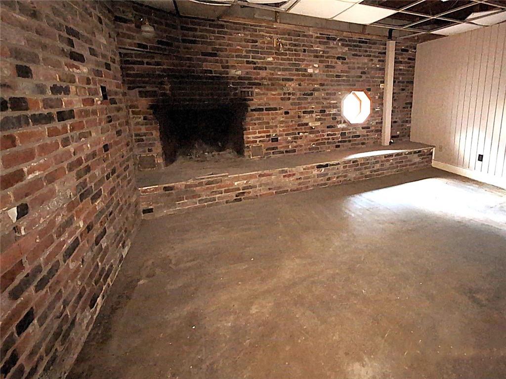 34 Walnut Avenue Dunbar, PA 15431 - Photo 13 of 13 a view of a fireplace with a door