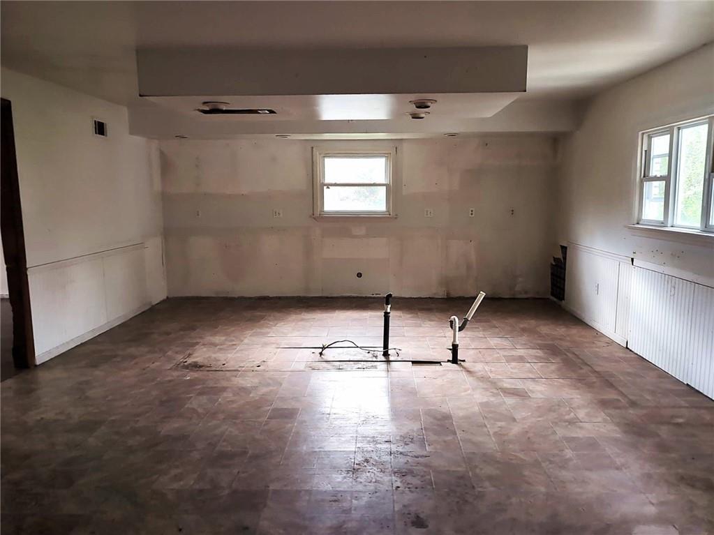 34 Walnut Avenue Dunbar, PA 15431 - Photo 7 of 13 a view of wooden floor and windows in a room