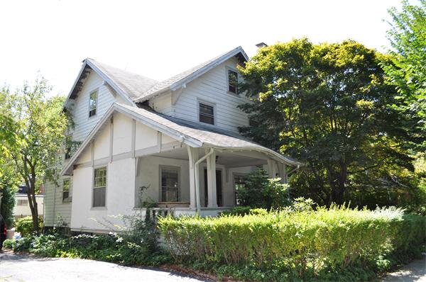 52 Salisbury Road Brookline, MA 02445 - Photo 1 of 1 a front view of house with a yard and green space