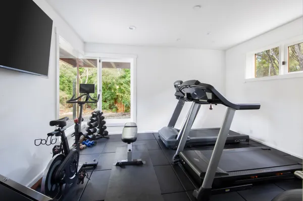 a view of a room with gym equipment