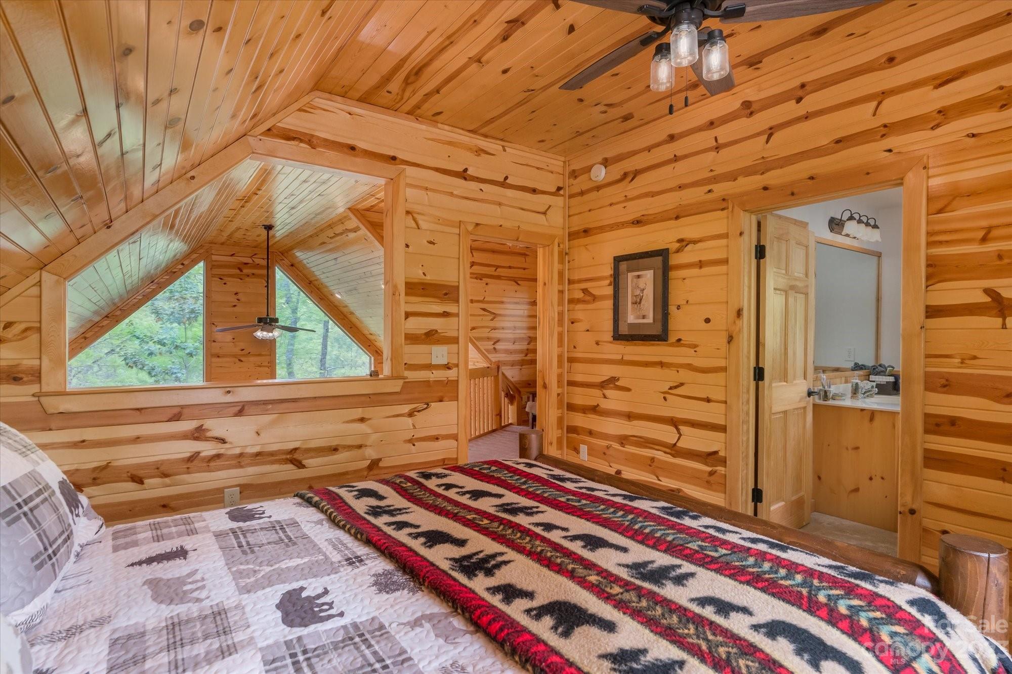 144 Camp David Road Murphy, NC 28906 - Photo 15 of 46 a view of a room with a bed and a window