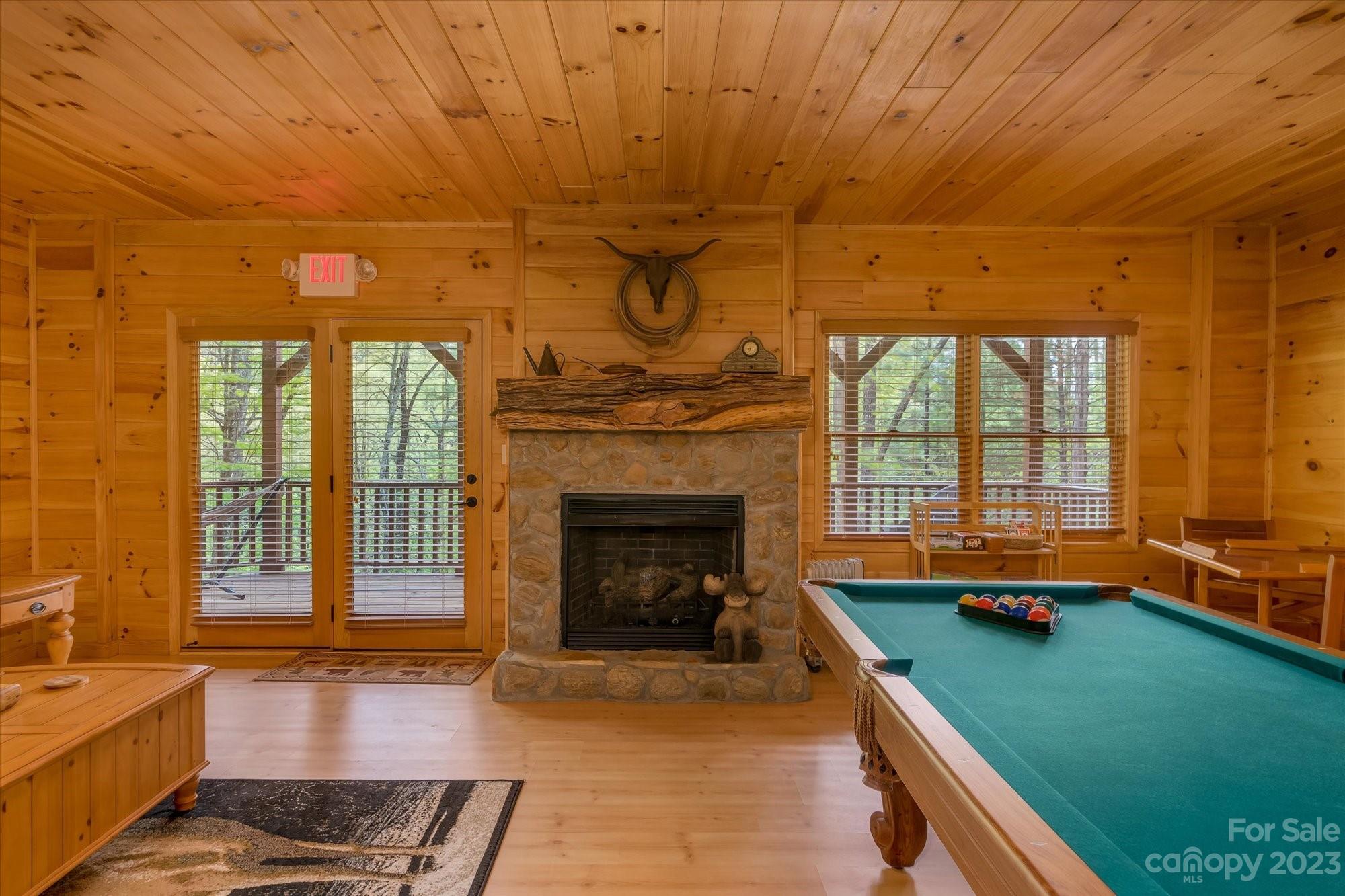 144 Camp David Road Murphy, NC 28906 - Photo 19 of 46 a room with pool table and windows