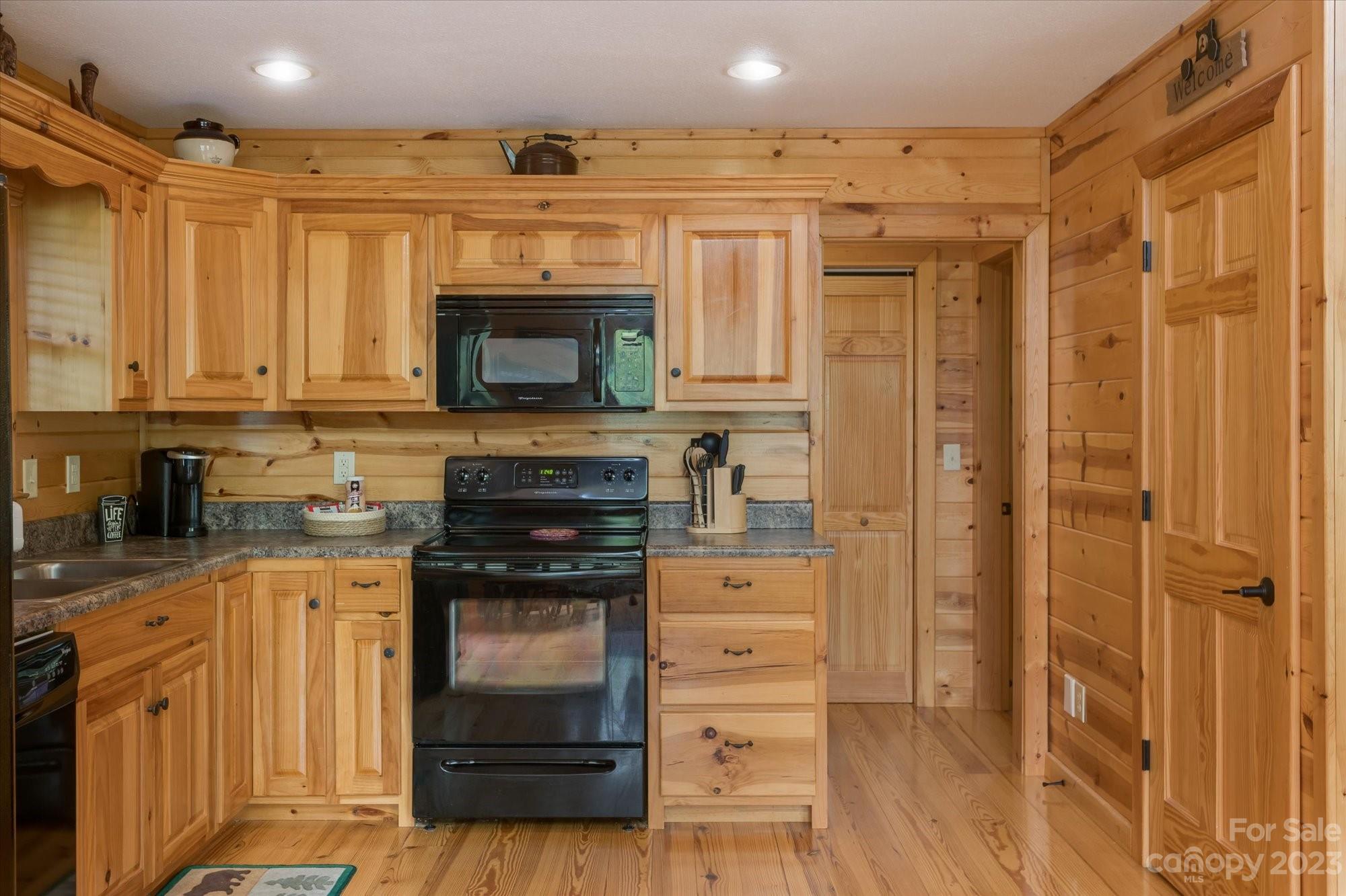 144 Camp David Road Murphy, NC 28906 - Photo 36 of 46 a kitchen with stainless steel appliances a stove and a refrigerator