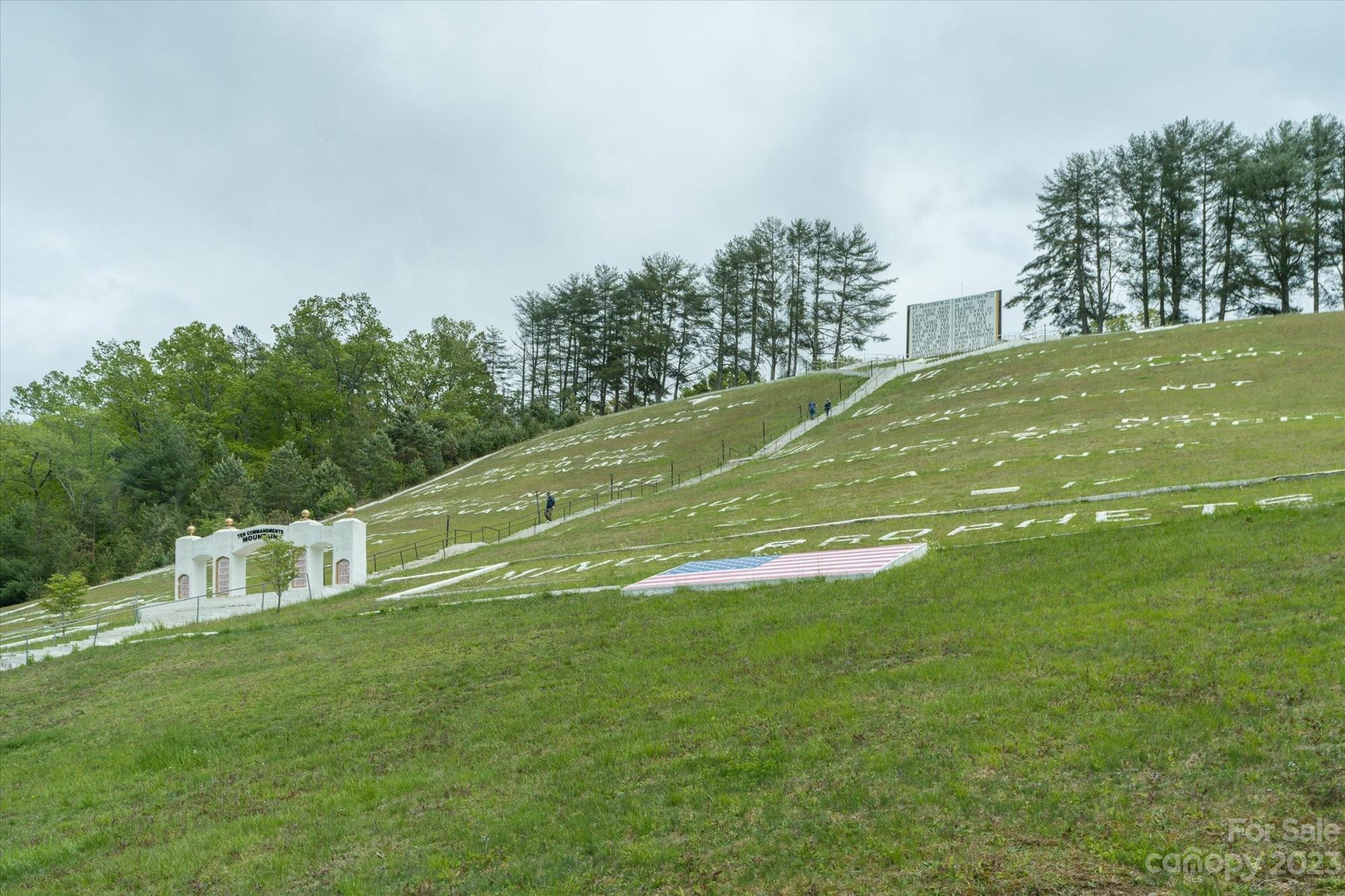 144 Camp David Road Murphy, NC 28906 - Photo 45 of 46 a view of a green field with clear sky