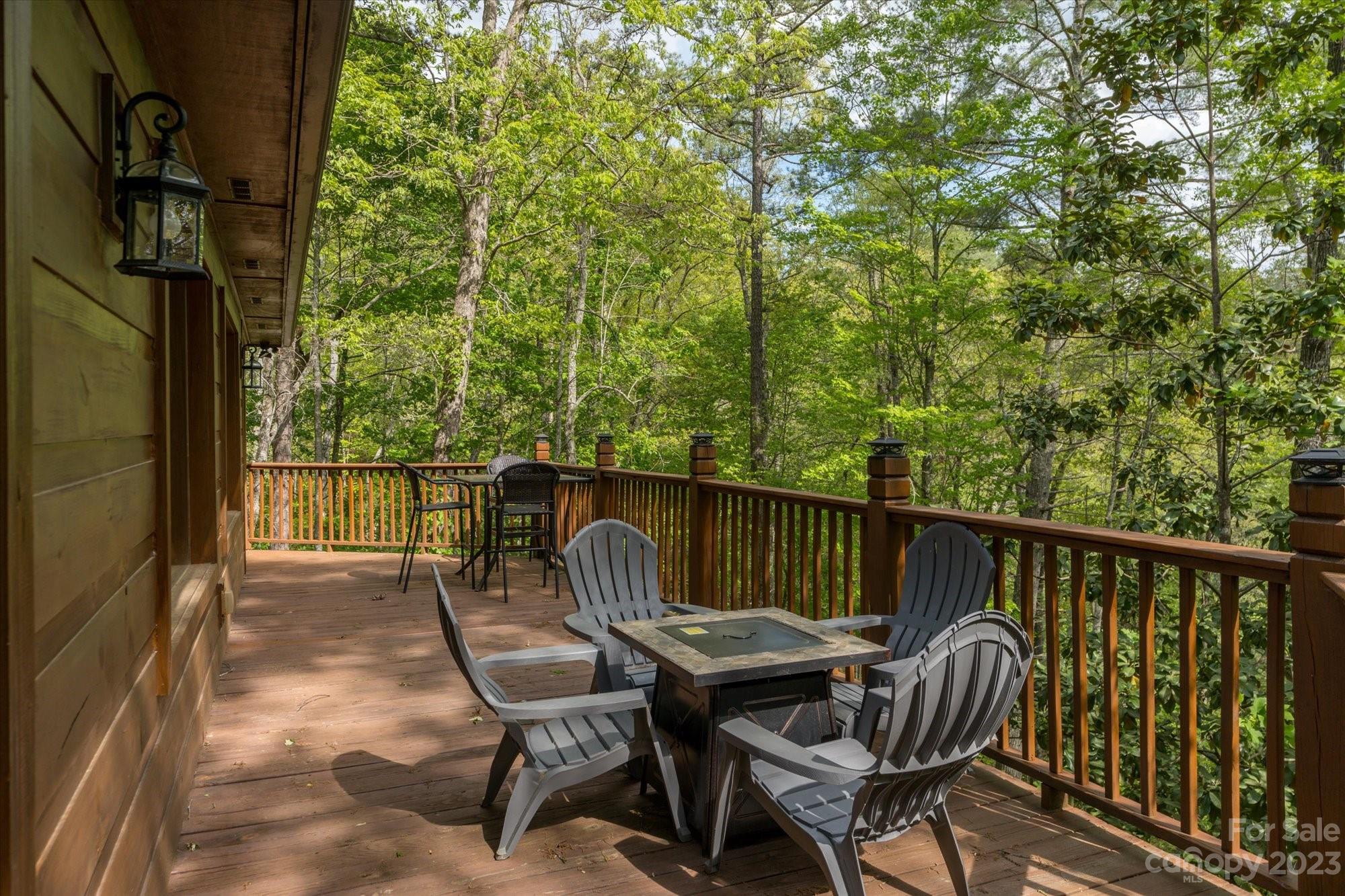 144 Camp David Road Murphy, NC 28906 - Photo 6 of 46 a view of a chair and table on the deck