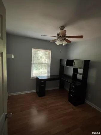 a room with furniture and window