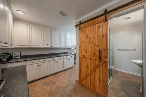 a room with storage and utility room