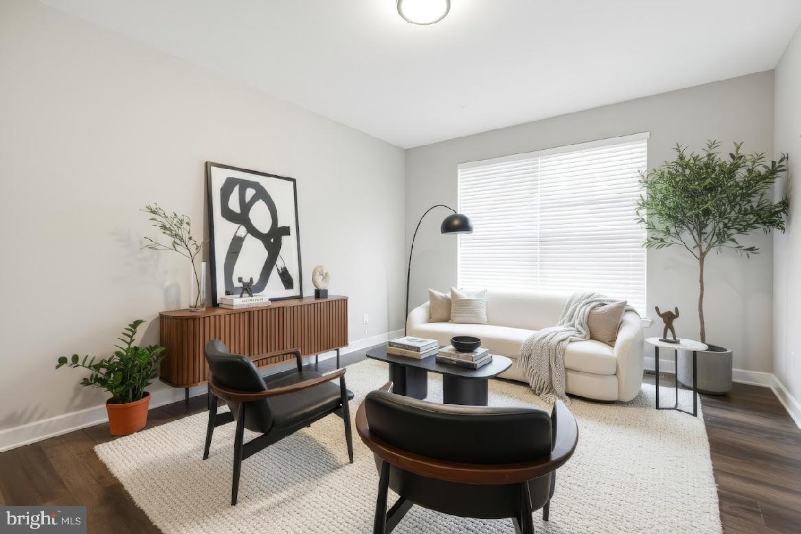119 Basin Road Hammonton, NJ 08037 - Photo 2 of 29 a living room with furniture a table and a potted plant